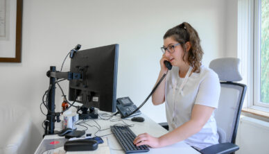 Staff speaking with a patient on the phone
